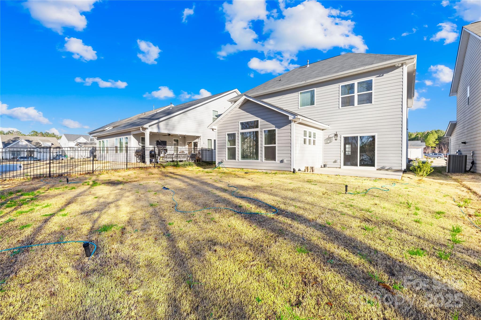 8005 Rolling Wheels Road Charlotte, NC 28215 - Photo 37 of 40 a view of a house with a big yard