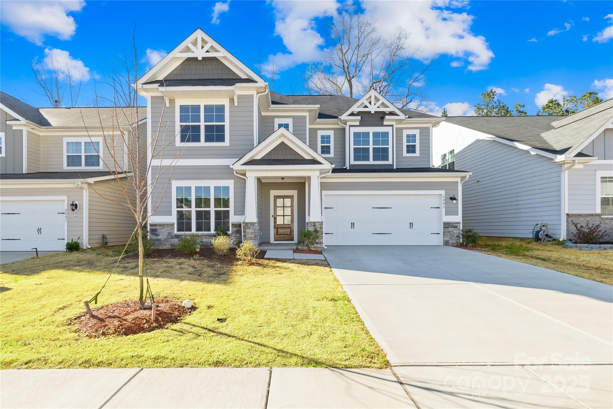 8005 Rolling Wheels Road Charlotte, NC 28215 - Photo 40 of 40 a front view of a house with swimming pool
