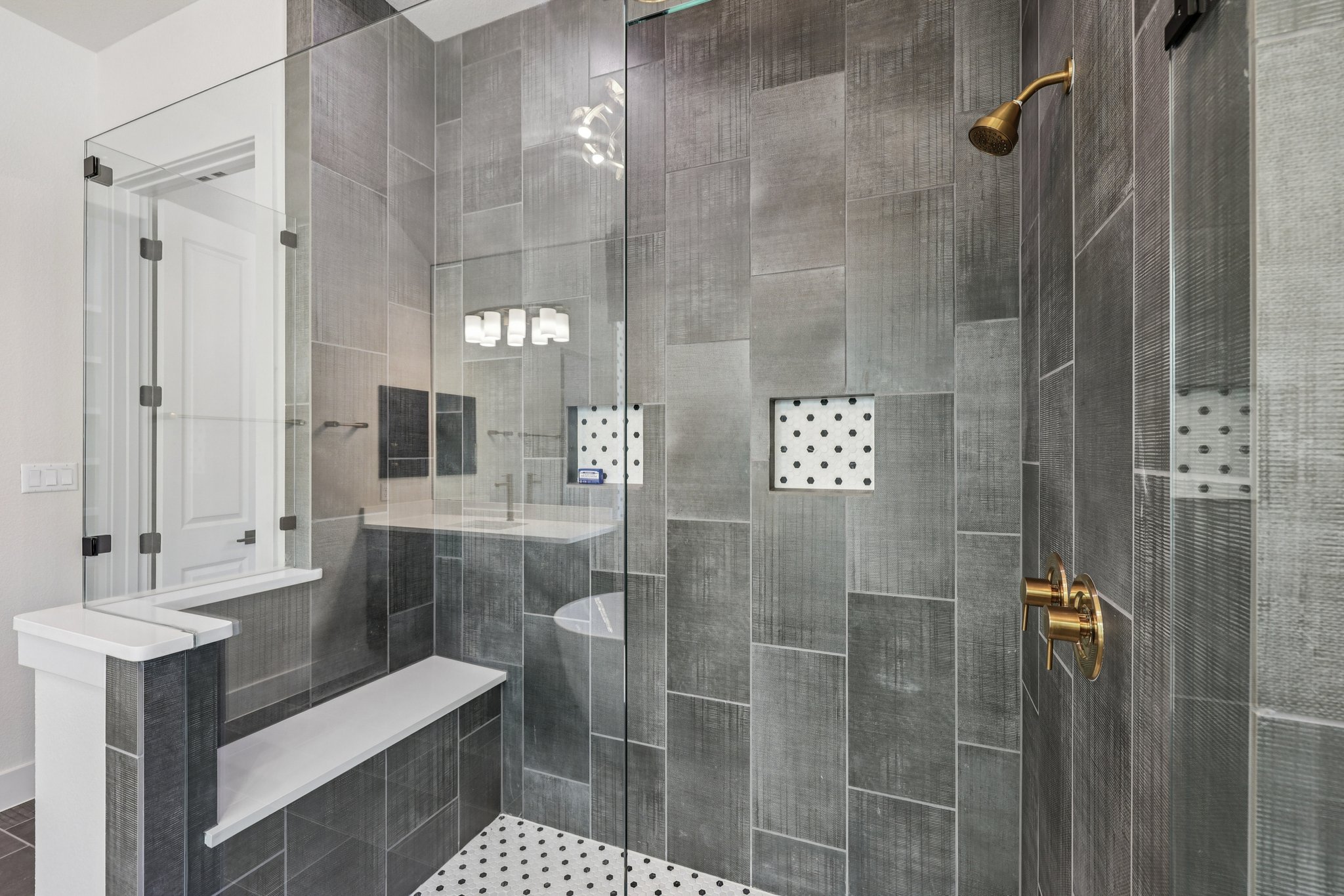 19316 Splendor Court Jonestown, TX 78645 - Photo 20 of 40 a bathroom with a shower and a sink