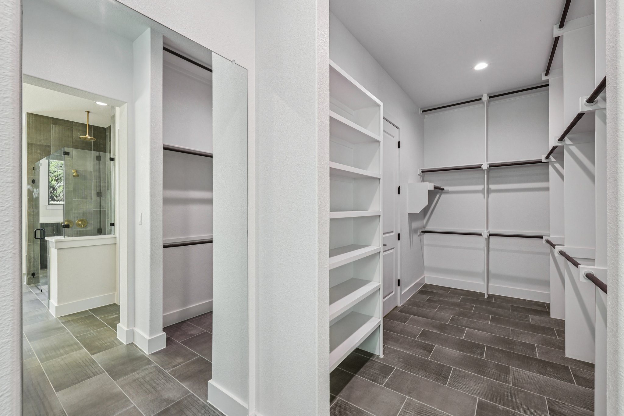 19316 Splendor Court Jonestown, TX 78645 - Photo 21 of 40 a view of entryway with stairs and white cabinets