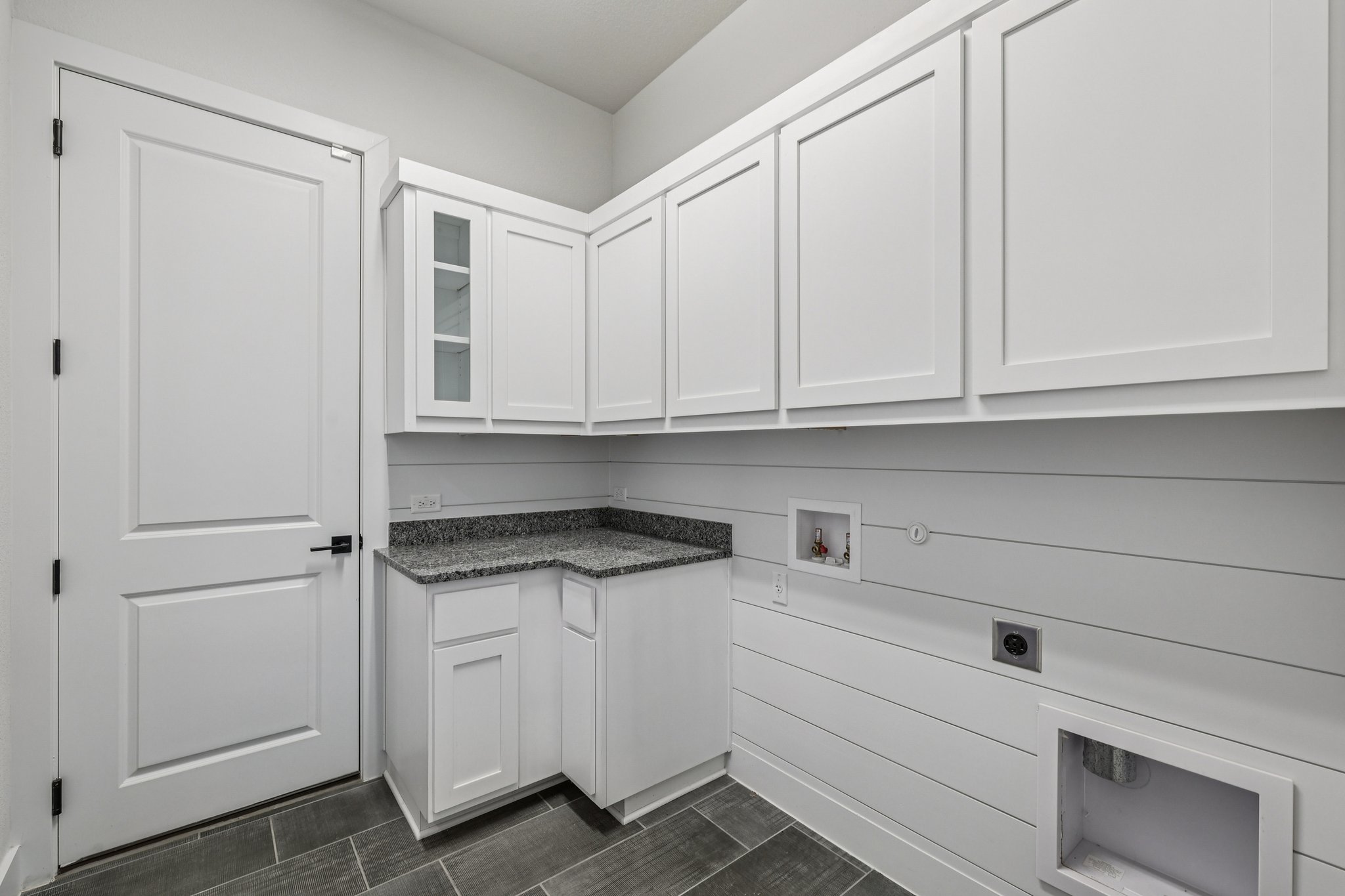 19316 Splendor Court Jonestown, TX 78645 - Photo 22 of 40 a view of cabinets and wooden floor