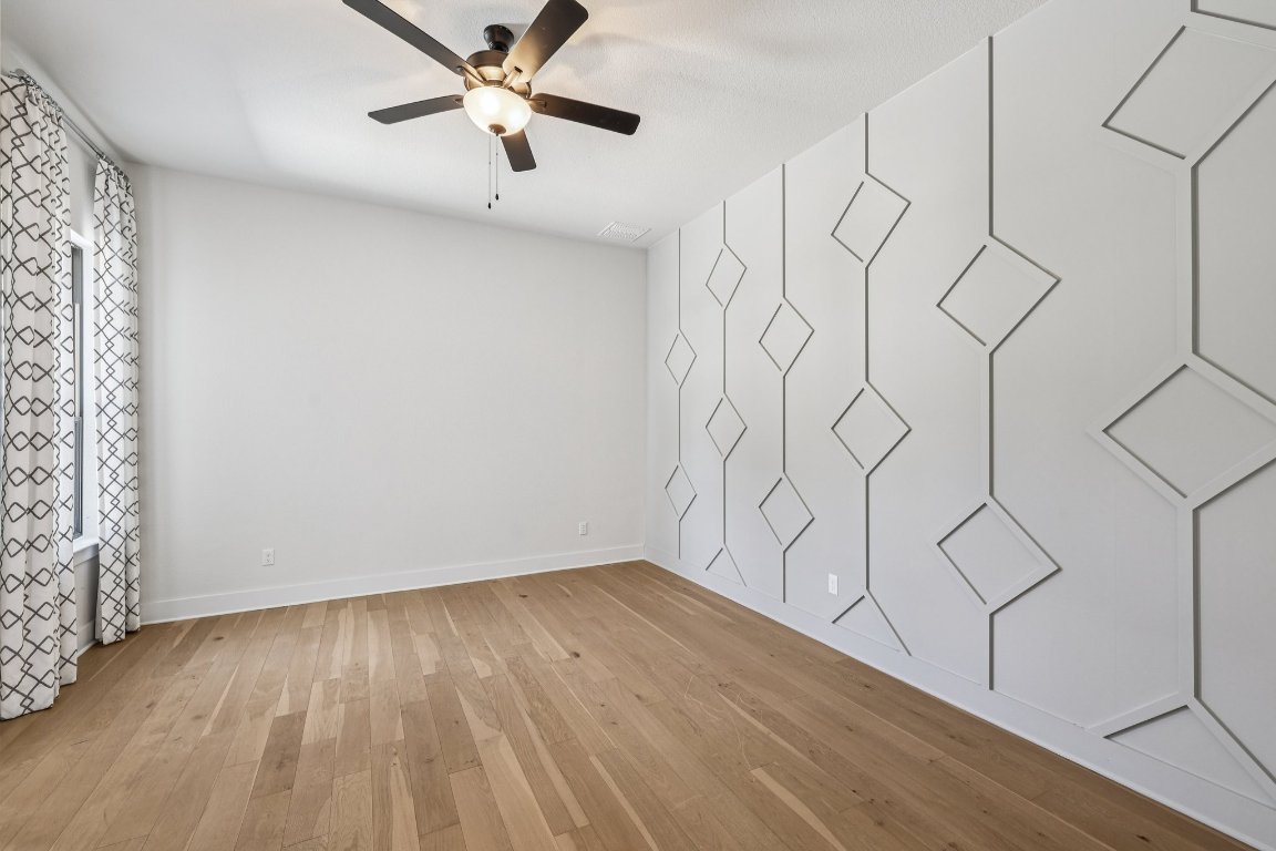 19316 Splendor Court Jonestown, TX 78645 - Photo 24 of 40 a view of an entryway with wooden floor