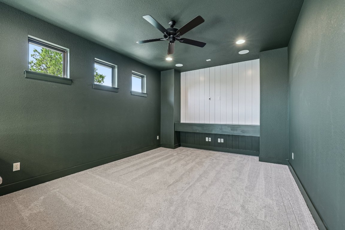 19316 Splendor Court Jonestown, TX 78645 - Photo 30 of 40 a view of an empty room with a ceiling fan
