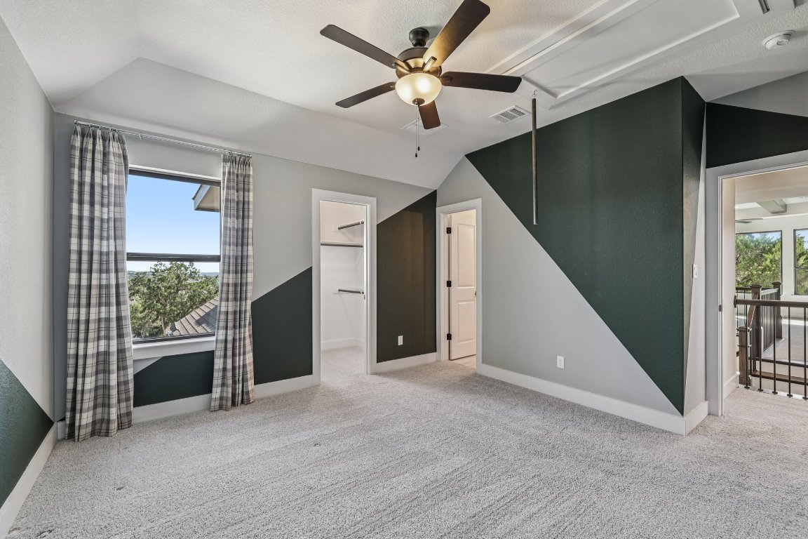 19316 Splendor Court Jonestown, TX 78645 - Photo 32 of 40 a view of a livingroom with a ceiling fan and window
