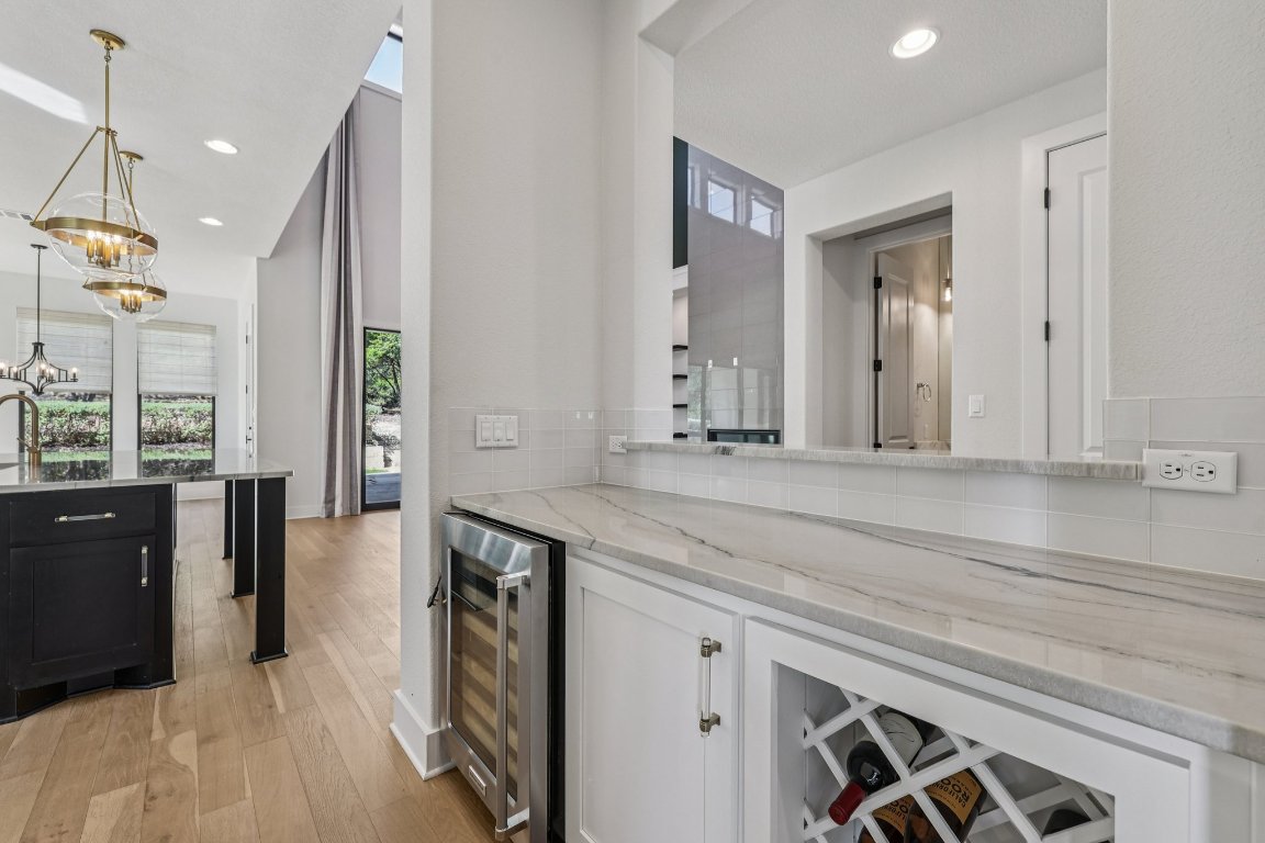 19316 Splendor Court Jonestown, TX 78645 - Photo 8 of 40 a spacious bathroom with a sink a vanity and a mirror