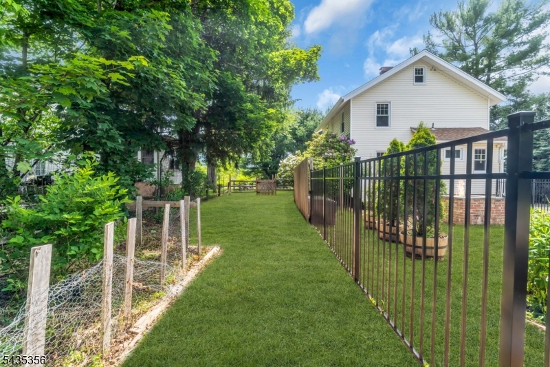 105 Somerville Road Bedminster, NJ 07921 - Photo 28 of 36 a view of a garden with a small yard