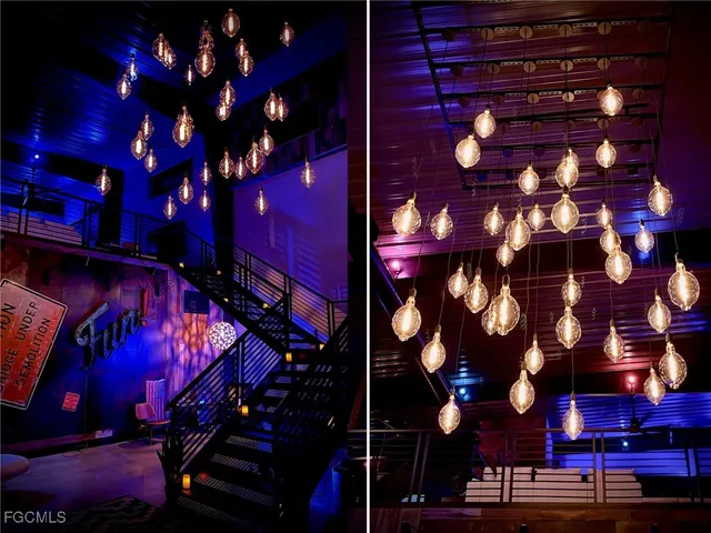 a view of a street with lots of swings and slides