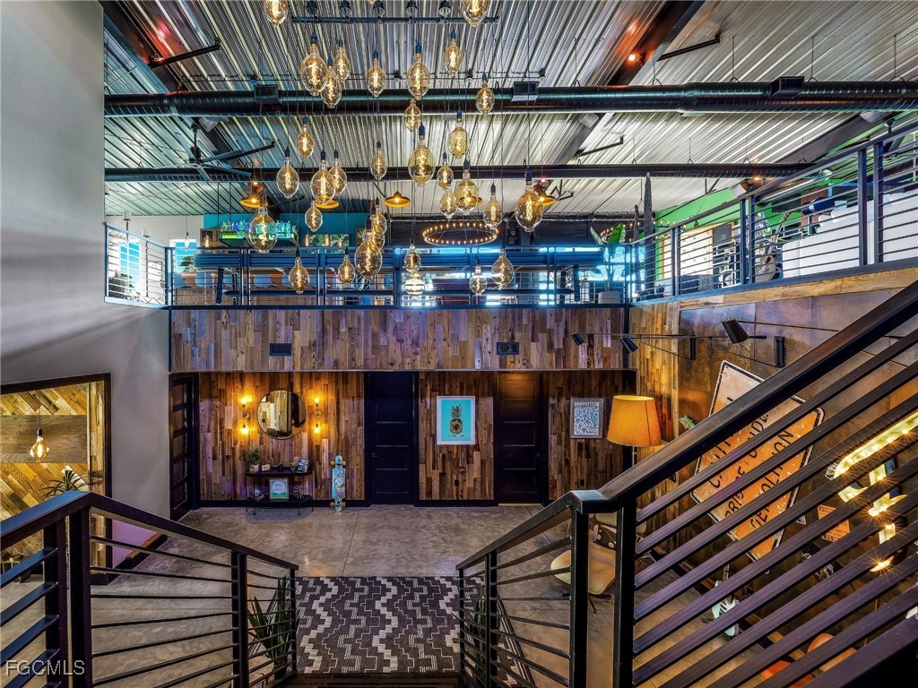 4412 Pinetree Boulevard St. James City, FL 33956 - Photo 13 of 50 a view of room with window and wooden floor