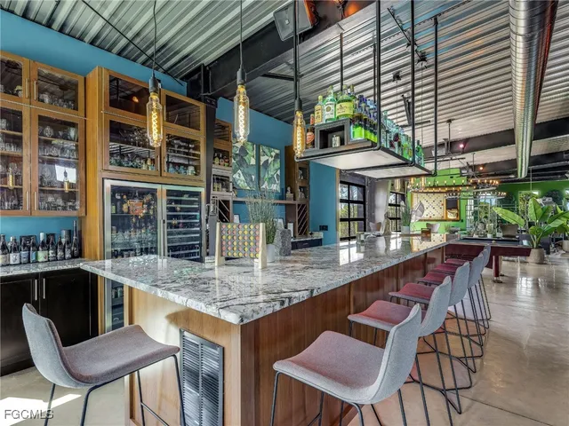a view of a chairs and tables in patio