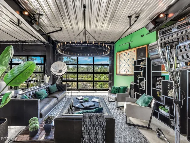 a view of a dining room with furniture and window