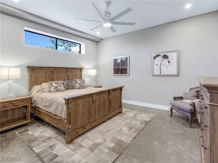 a view of a house with potted plants