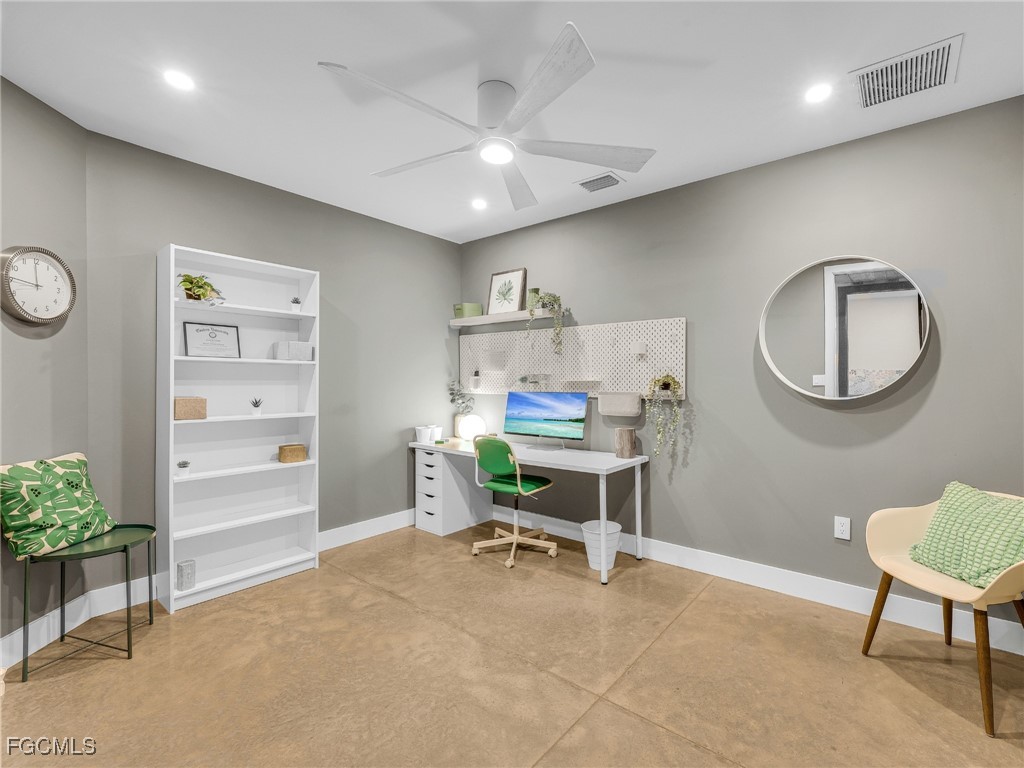 4412 Pinetree Boulevard St. James City, FL 33956 - Photo 37 of 50 a workspace with furniture