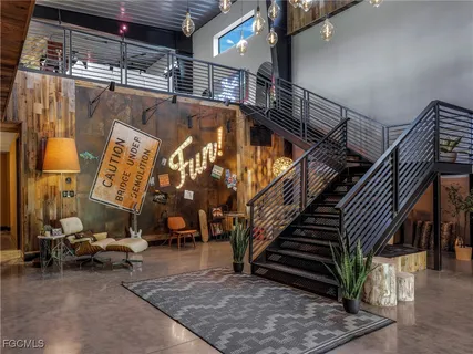 a kitchen with a table and chairs in it