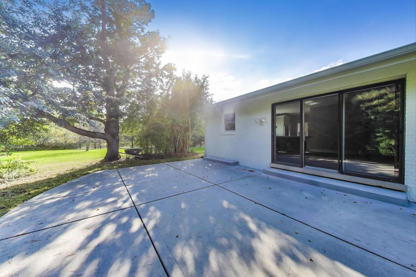 1627 South Ridge Road Lake Forest, IL 60045 - Photo 25 of 30 a view of a house with a yard