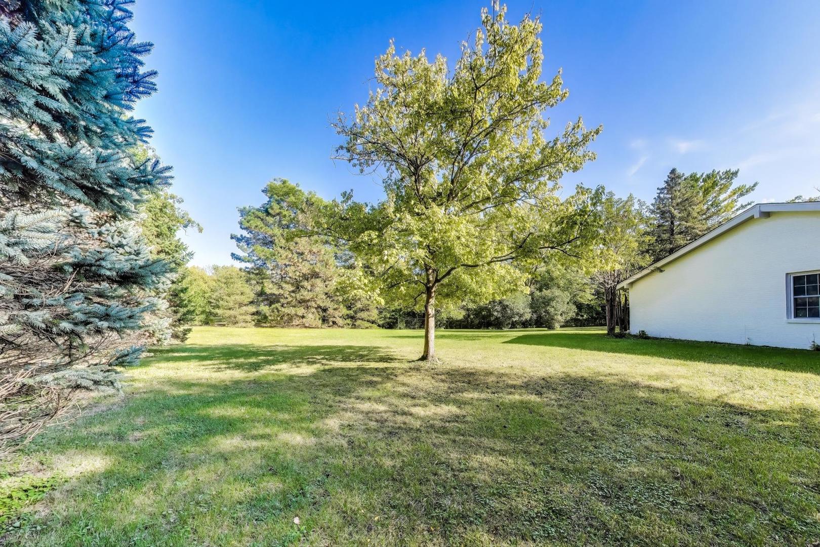 1627 South Ridge Road Lake Forest, IL 60045 - Photo 28 of 30 a view of outdoor space with deck and yard