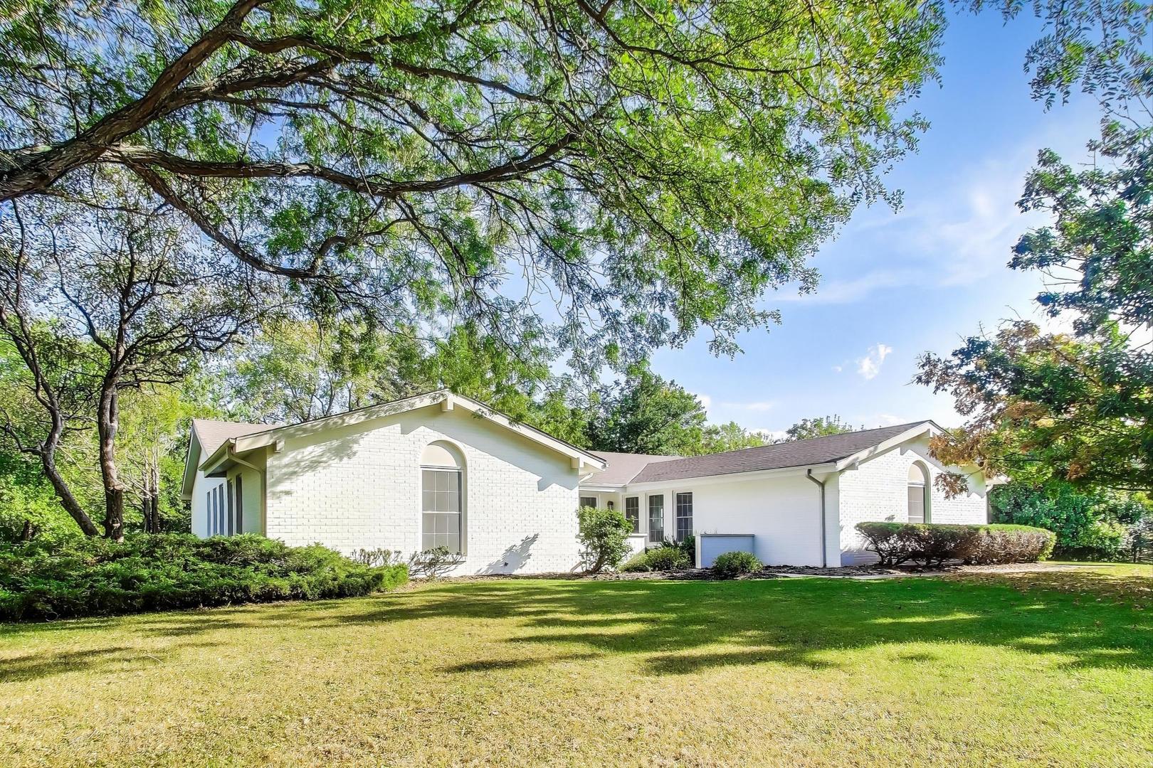 1627 South Ridge Road Lake Forest, IL 60045 - Photo 4 of 30 a view of a house with a yard
