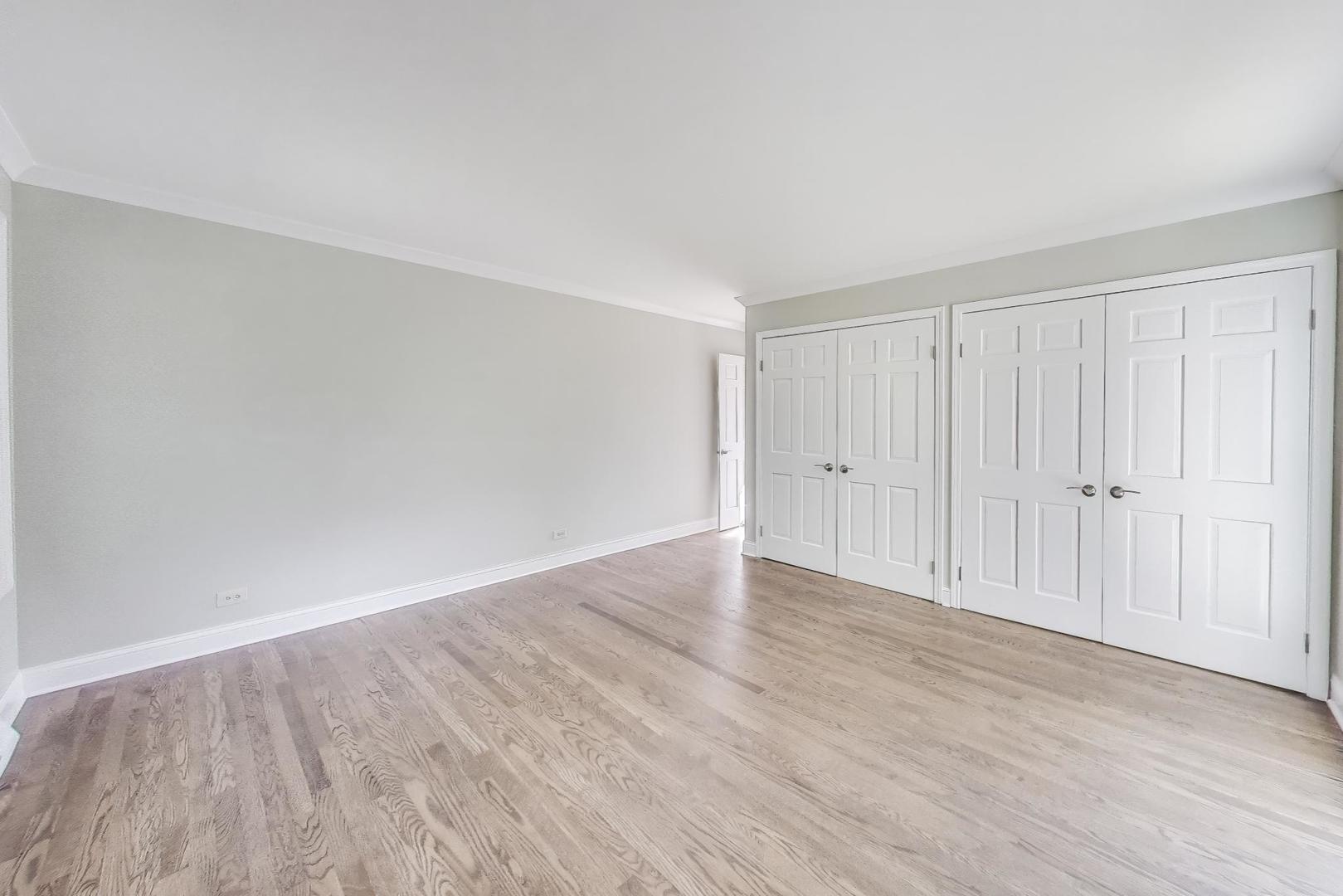 1627 South Ridge Road Lake Forest, IL 60045 - Photo 10 of 30 a view of an empty room and wooden floor