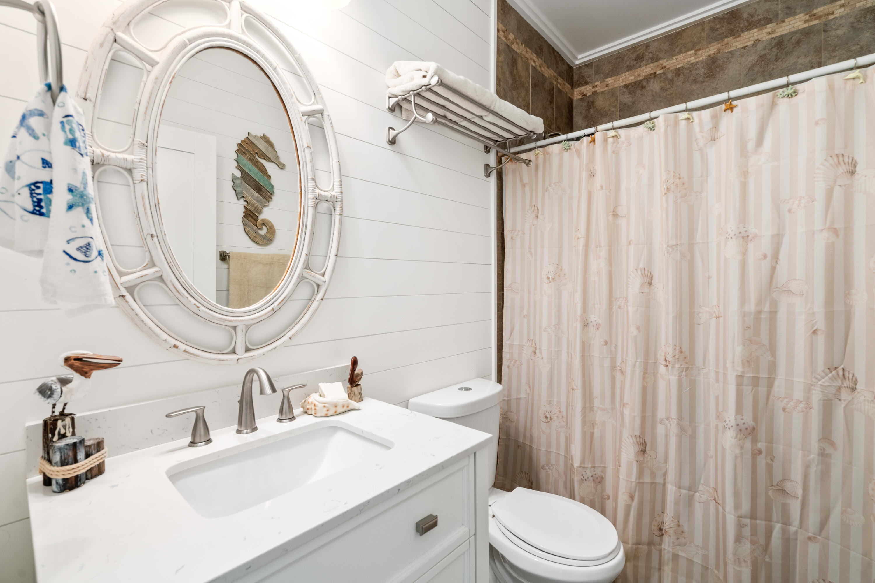 528 Bay Grove Road Freeport, FL 32439 - Photo 28 of 68 a bathroom with a sink a toilet and a mirror