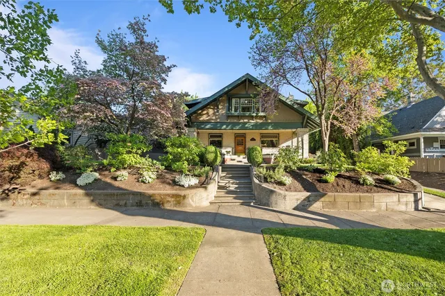 an outdoor space with furniture and garden