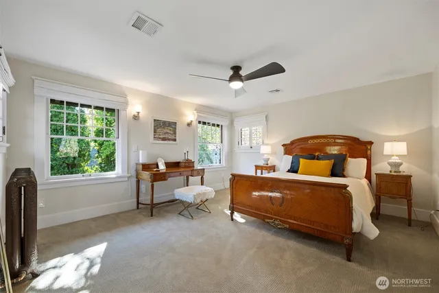 a bed room with a bed and a window