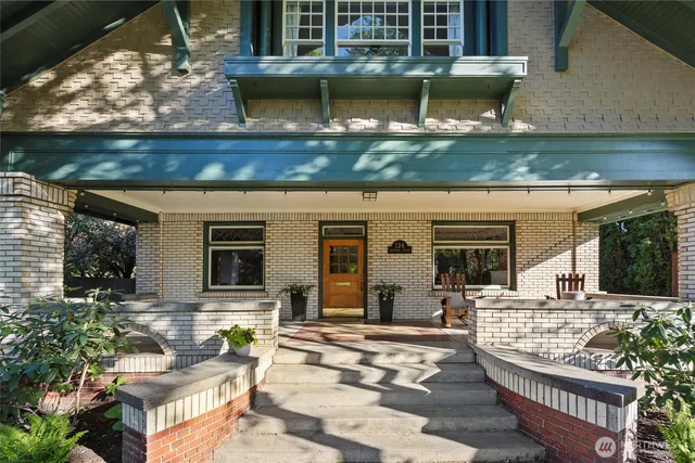 a view of a house with outdoor seating area