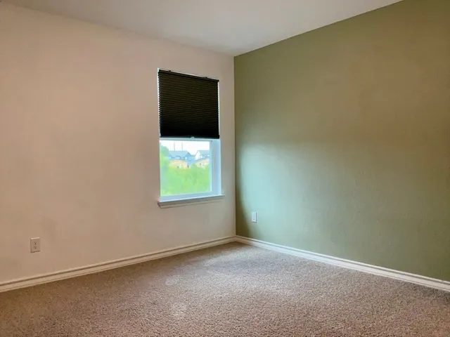 a view of a livingroom from a room