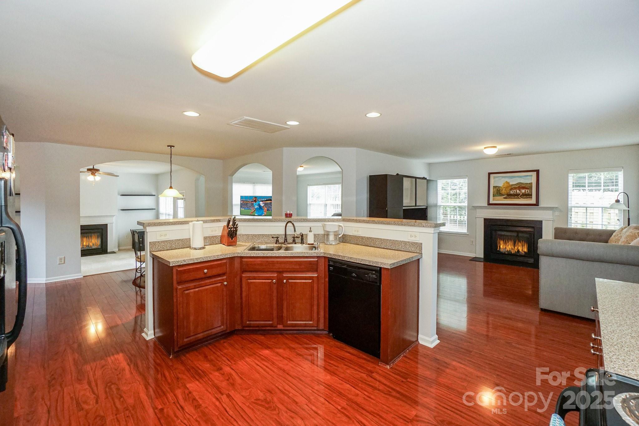 166 Glennallen Road Mooresville, NC 28115 - Photo 16 of 48 a large kitchen with stainless steel appliances granite countertop a large center island and a sink