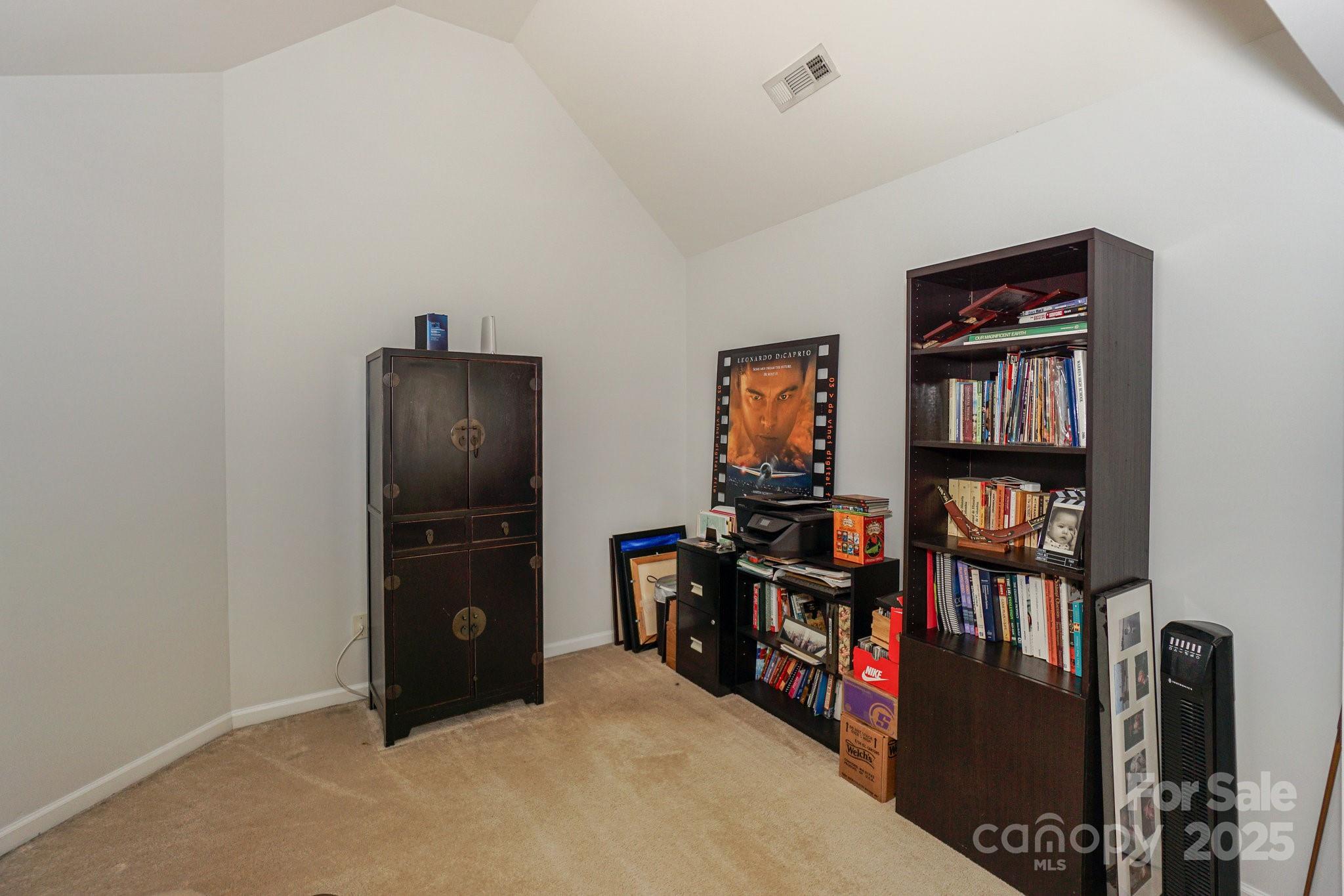 166 Glennallen Road Mooresville, NC 28115 - Photo 26 of 48 a view of a livingroom with furniture and closet