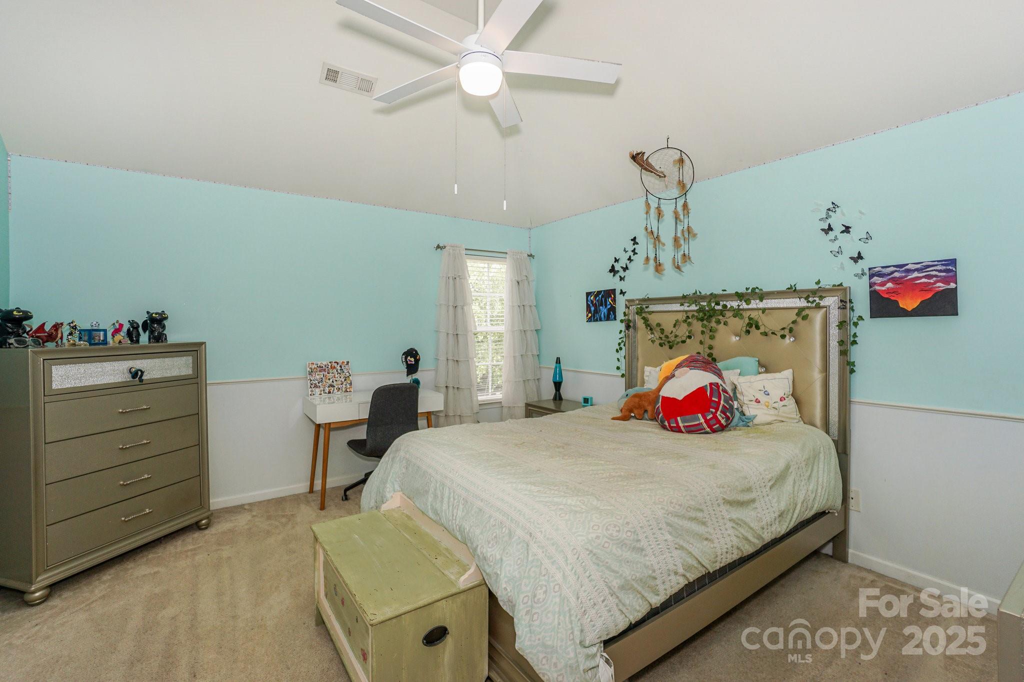 166 Glennallen Road Mooresville, NC 28115 - Photo 35 of 48 a bedroom with a bed and cabinets