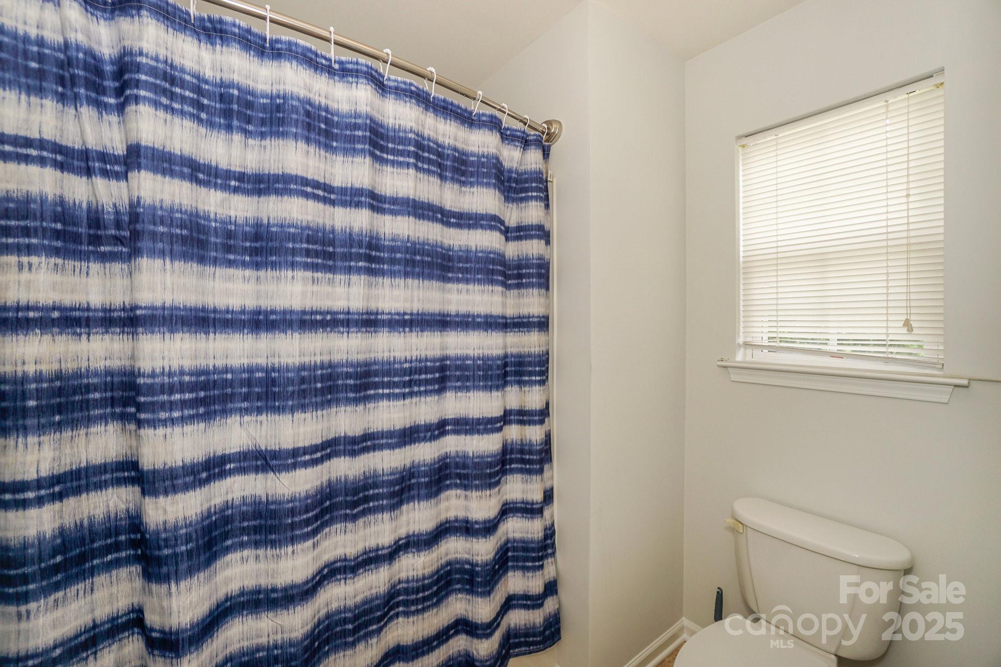 166 Glennallen Road Mooresville, NC 28115 - Photo 38 of 48 a bathroom with a sink and a toilet