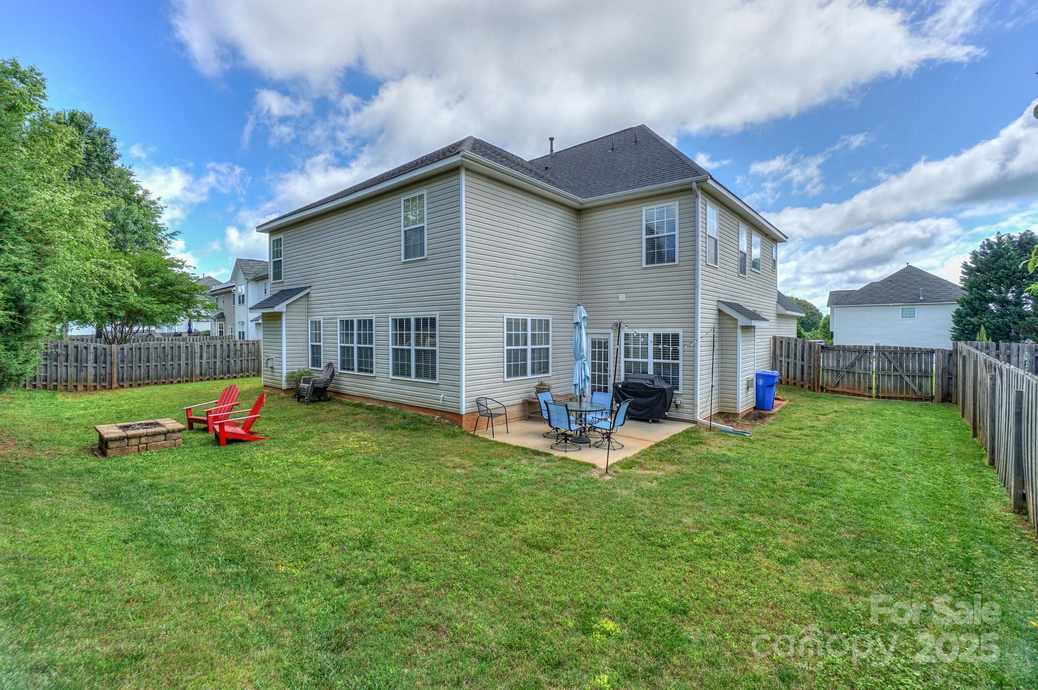 166 Glennallen Road Mooresville, NC 28115 - Photo 42 of 48 a view of a house with backyard and sitting area