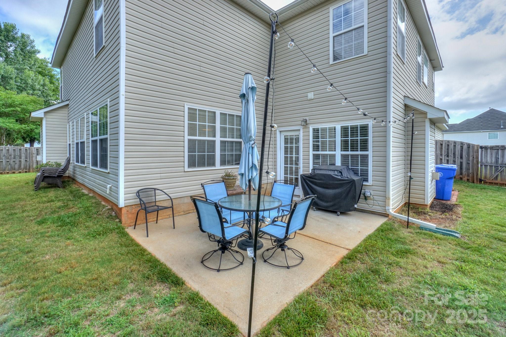 166 Glennallen Road Mooresville, NC 28115 - Photo 43 of 48 a view of a house with backyard and sitting area