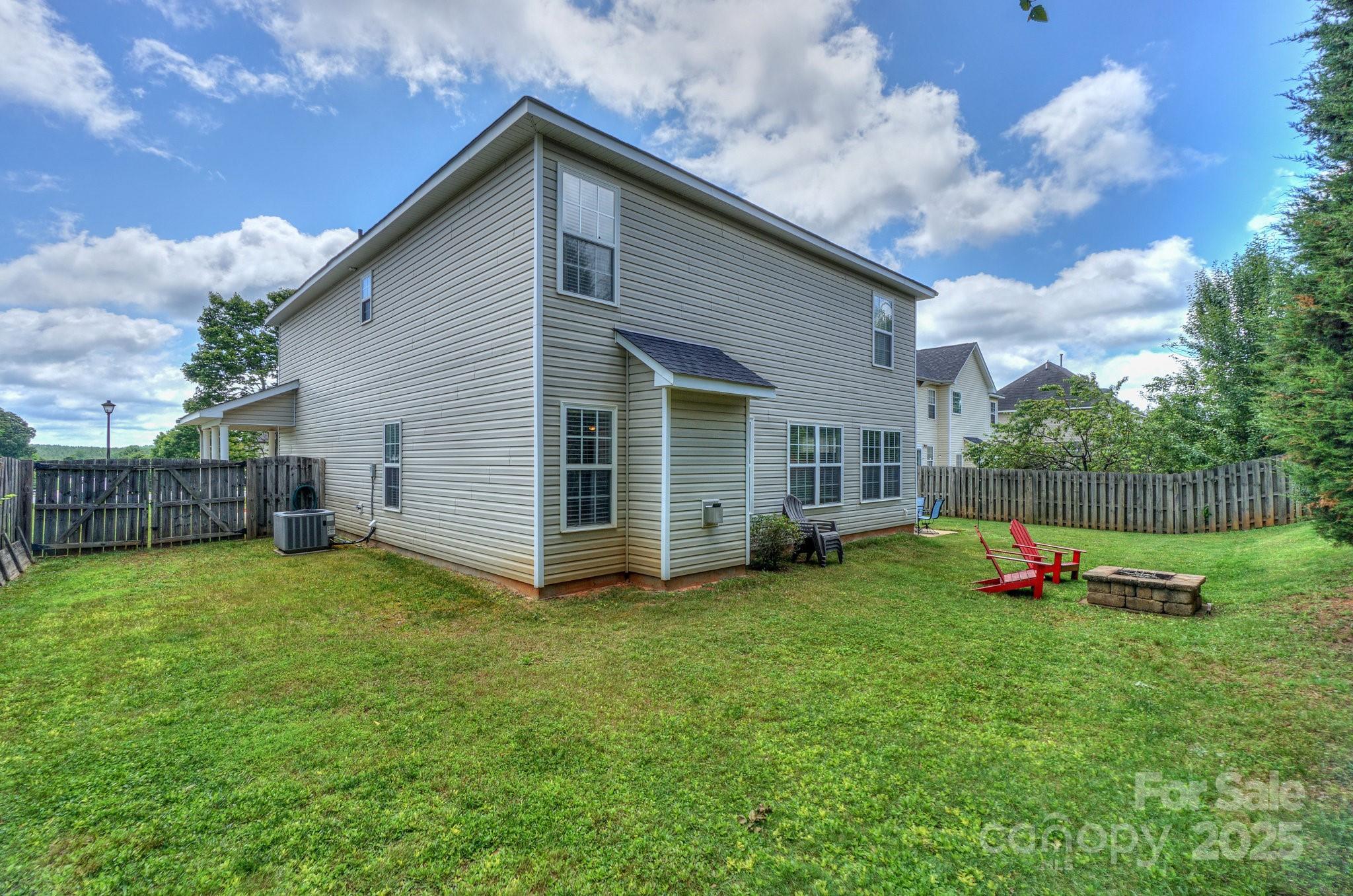 166 Glennallen Road Mooresville, NC 28115 - Photo 45 of 48 a view of a house with backyard and garden