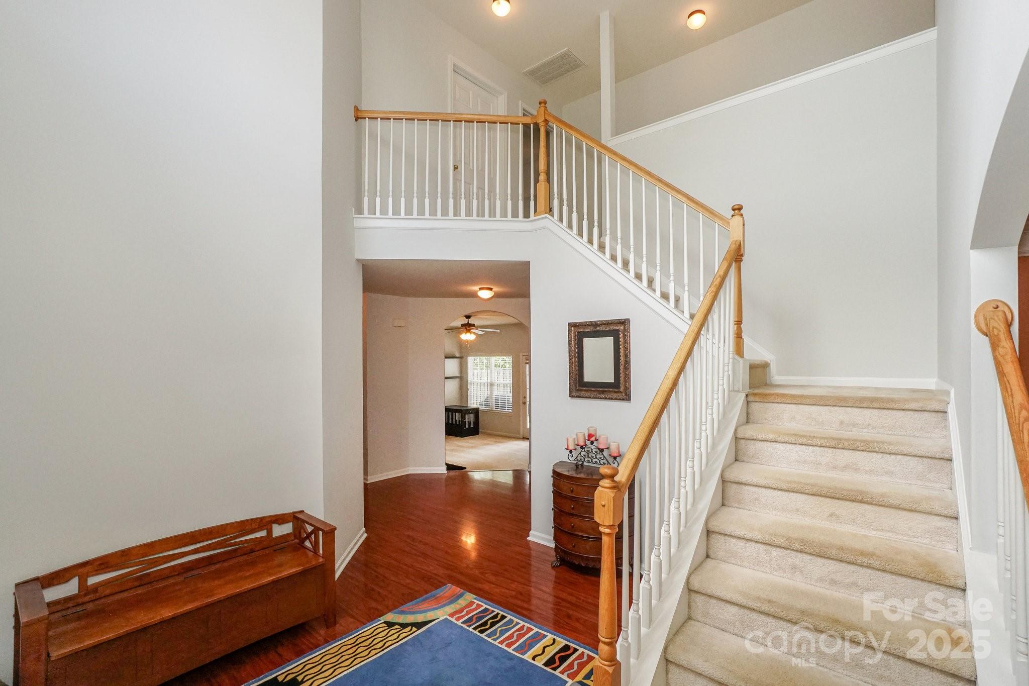 166 Glennallen Road Mooresville, NC 28115 - Photo 8 of 48 a view of entryway and hall with wooden floor