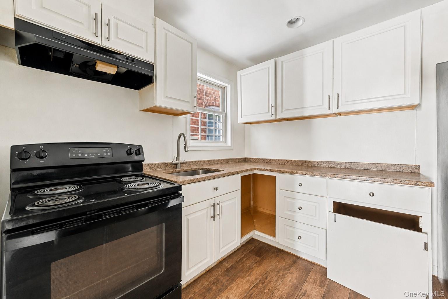 931 Diven Street Peekskill, NY 10566 - Photo 4 of 29 Kitchen with wood-finish flooring