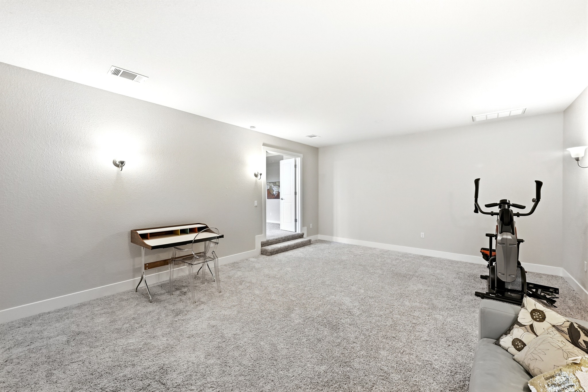 9008 Harper Rae Drive Austin, TX 78717 - Photo 25 of 39 Spacious room featuring light gray walls, plush carpeting, and recessed ceiling vents