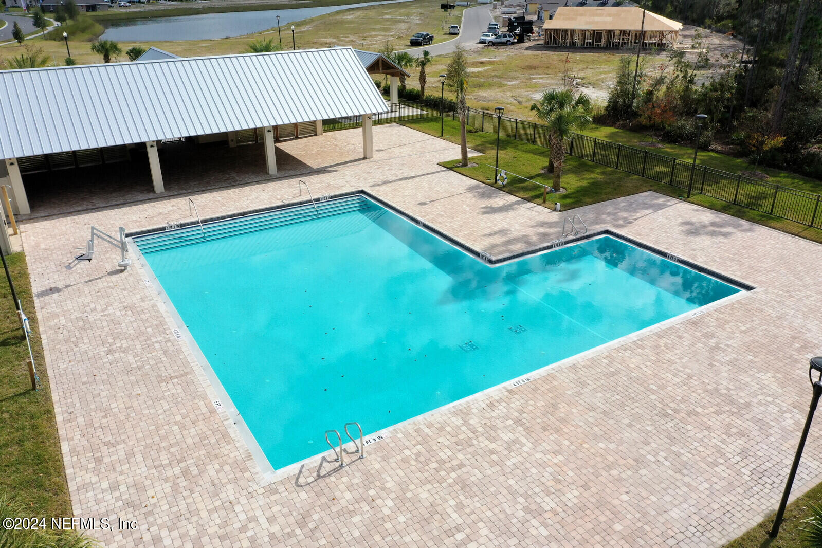70 Rivertown Road Palm Coast, FL 32137 - Photo 25 of 25 a view of a backyard with sitting area