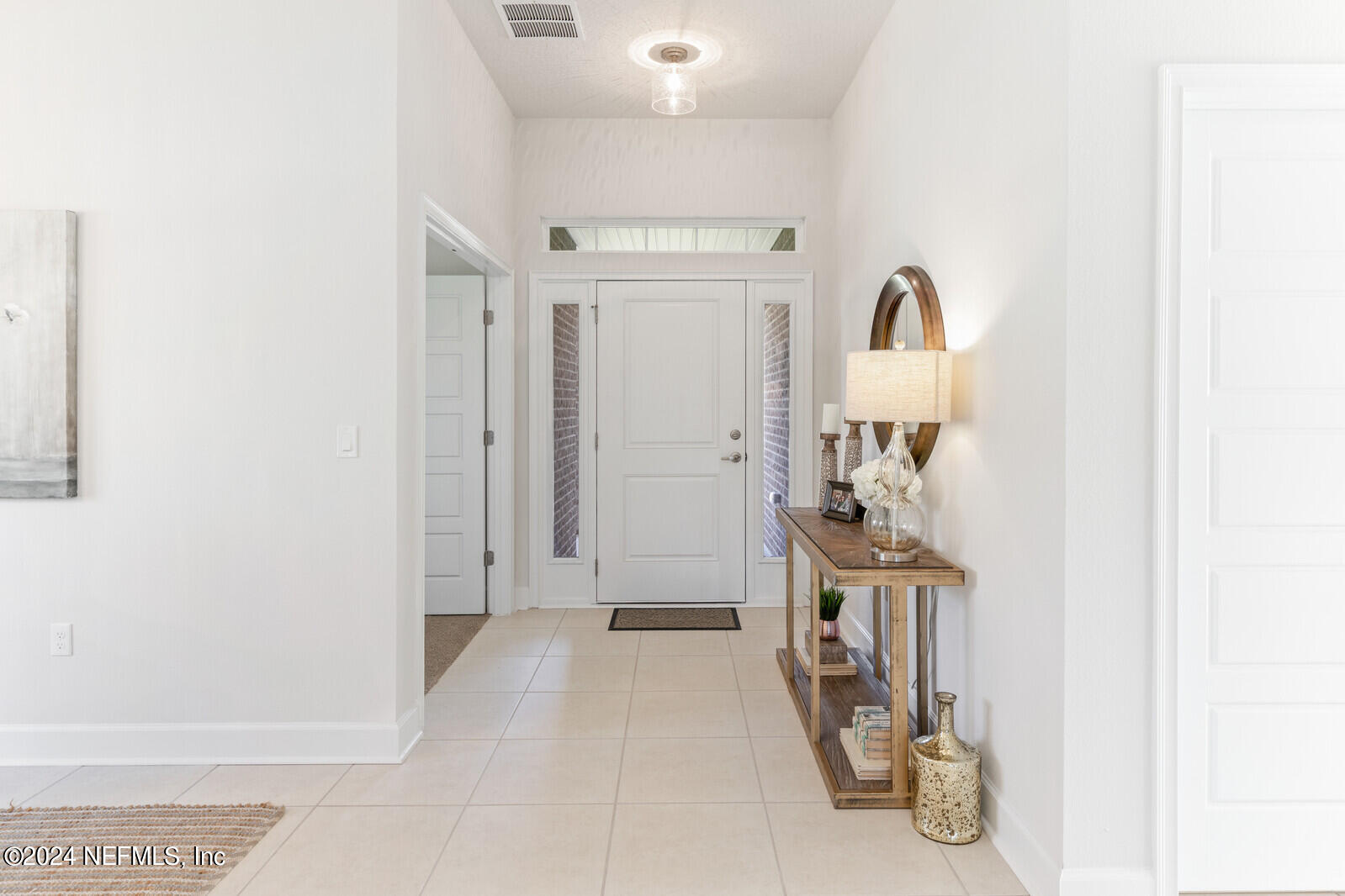 70 Rivertown Road Palm Coast, FL 32137 - Photo 3 of 25 a view of a room with gym equipment