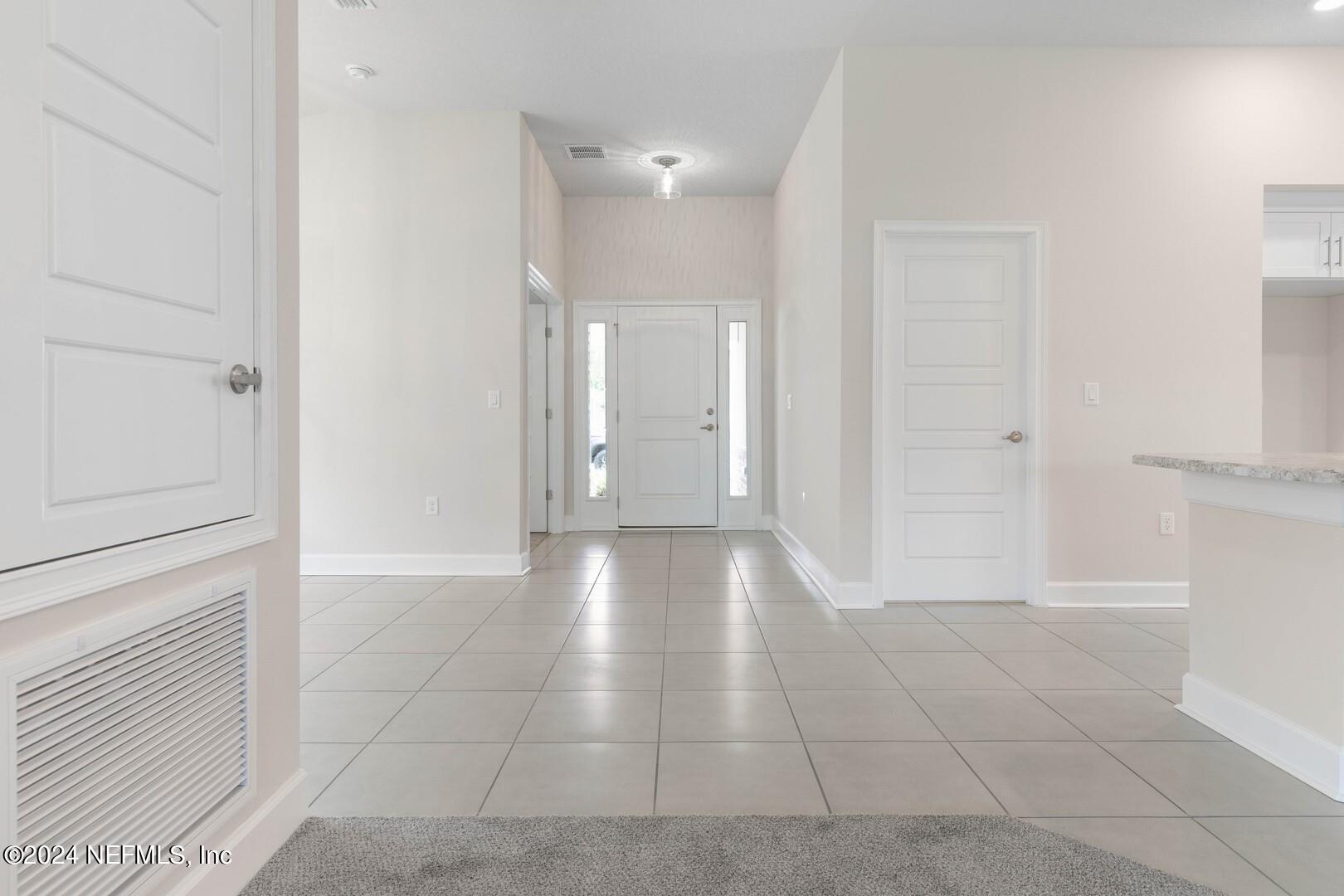 70 Rivertown Road Palm Coast, FL 32137 - Photo 5 of 25 a view of a room with an empty space