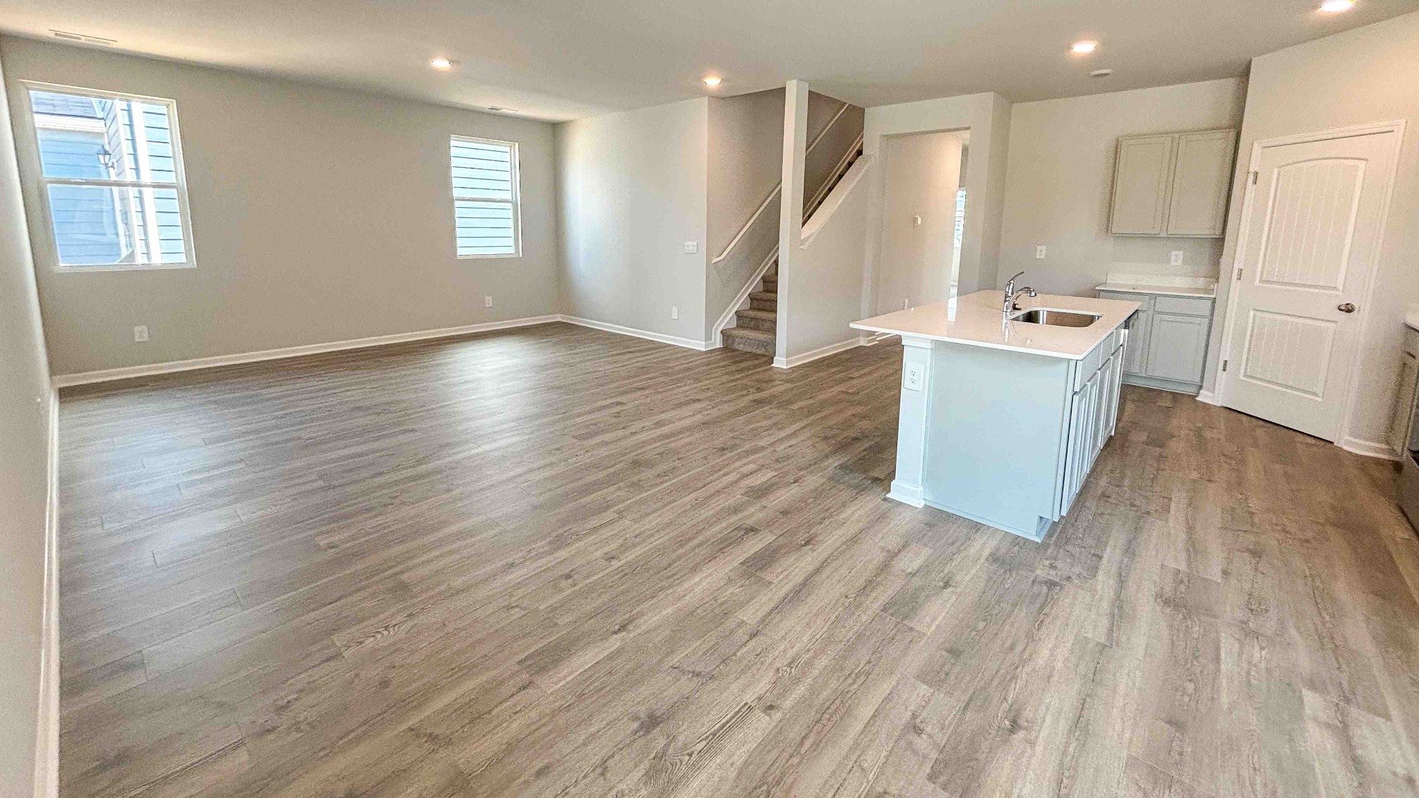 301 Harvest Point Boulevard Spring Hill, TN 37174 - Photo 16 of 25 a view of an empty room with a window and wooden floor