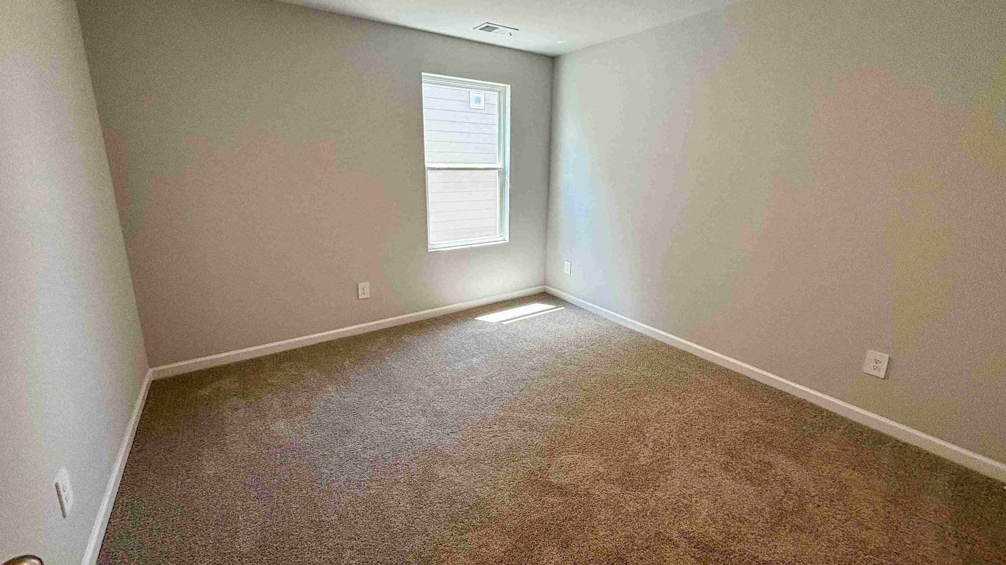 301 Harvest Point Boulevard Spring Hill, TN 37174 - Photo 19 of 25 an empty room with windows