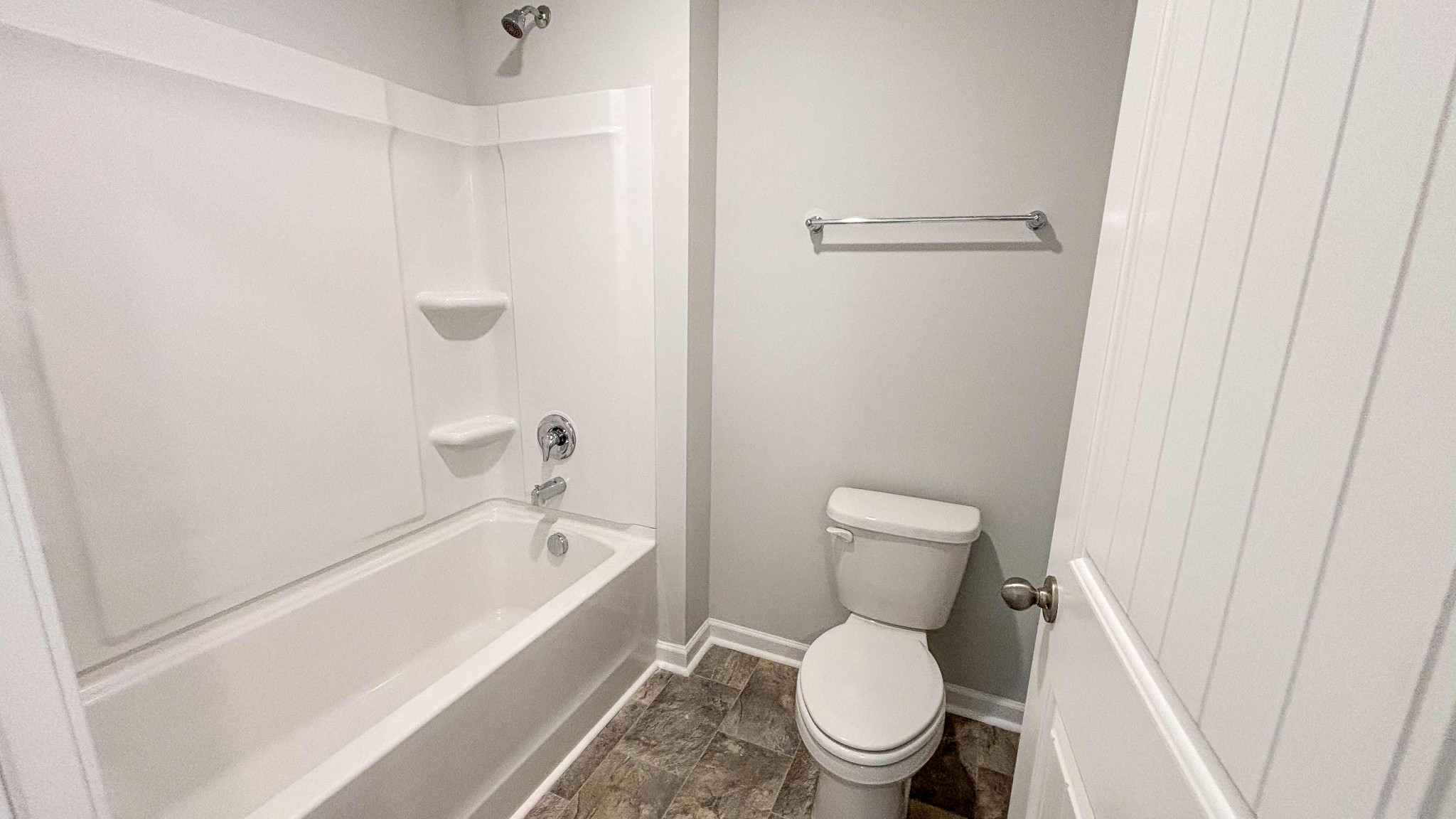 301 Harvest Point Boulevard Spring Hill, TN 37174 - Photo 25 of 25 a bathroom with a toilet and a tub