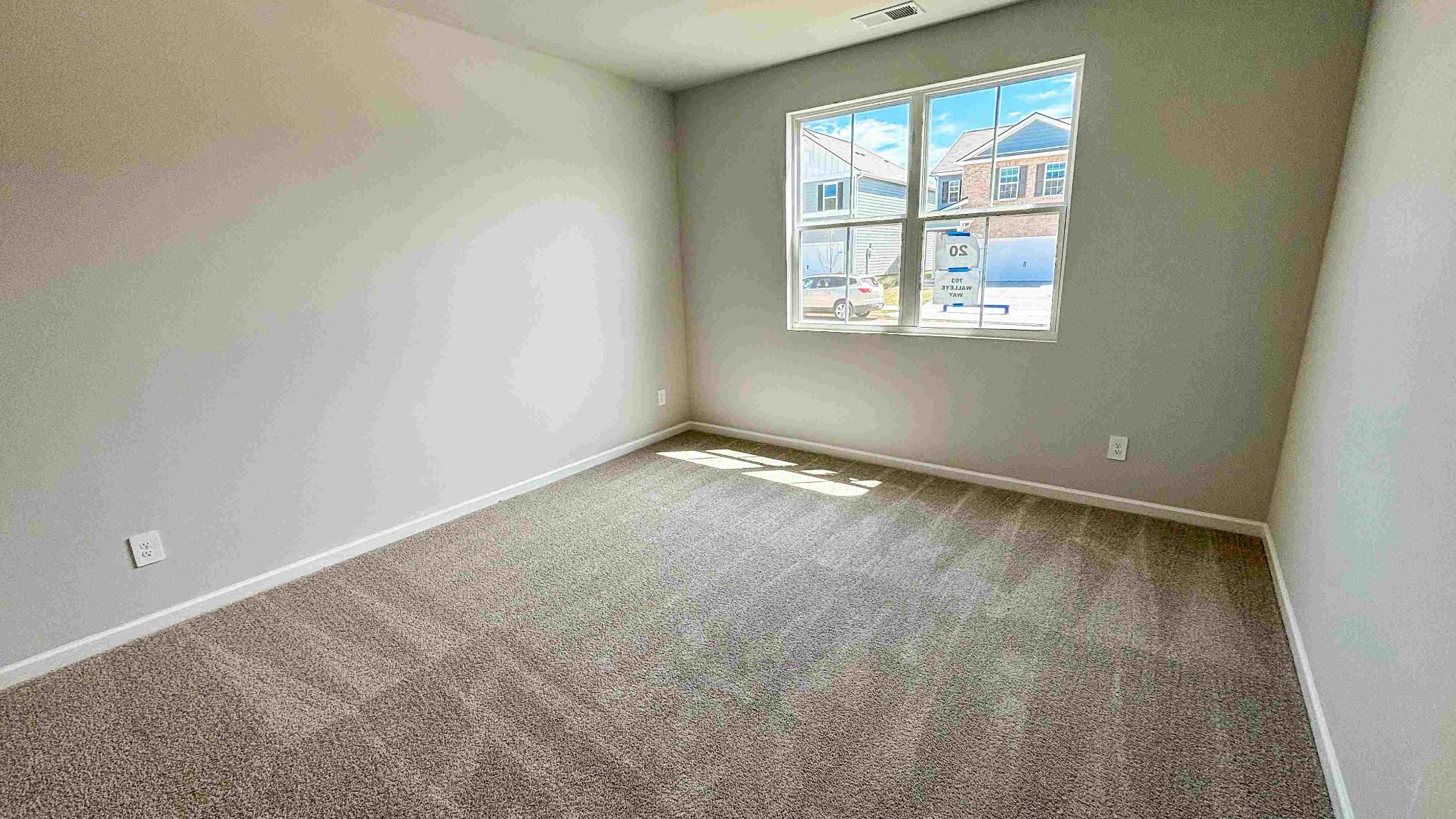 301 Harvest Point Boulevard Spring Hill, TN 37174 - Photo 6 of 25 an empty room with a window