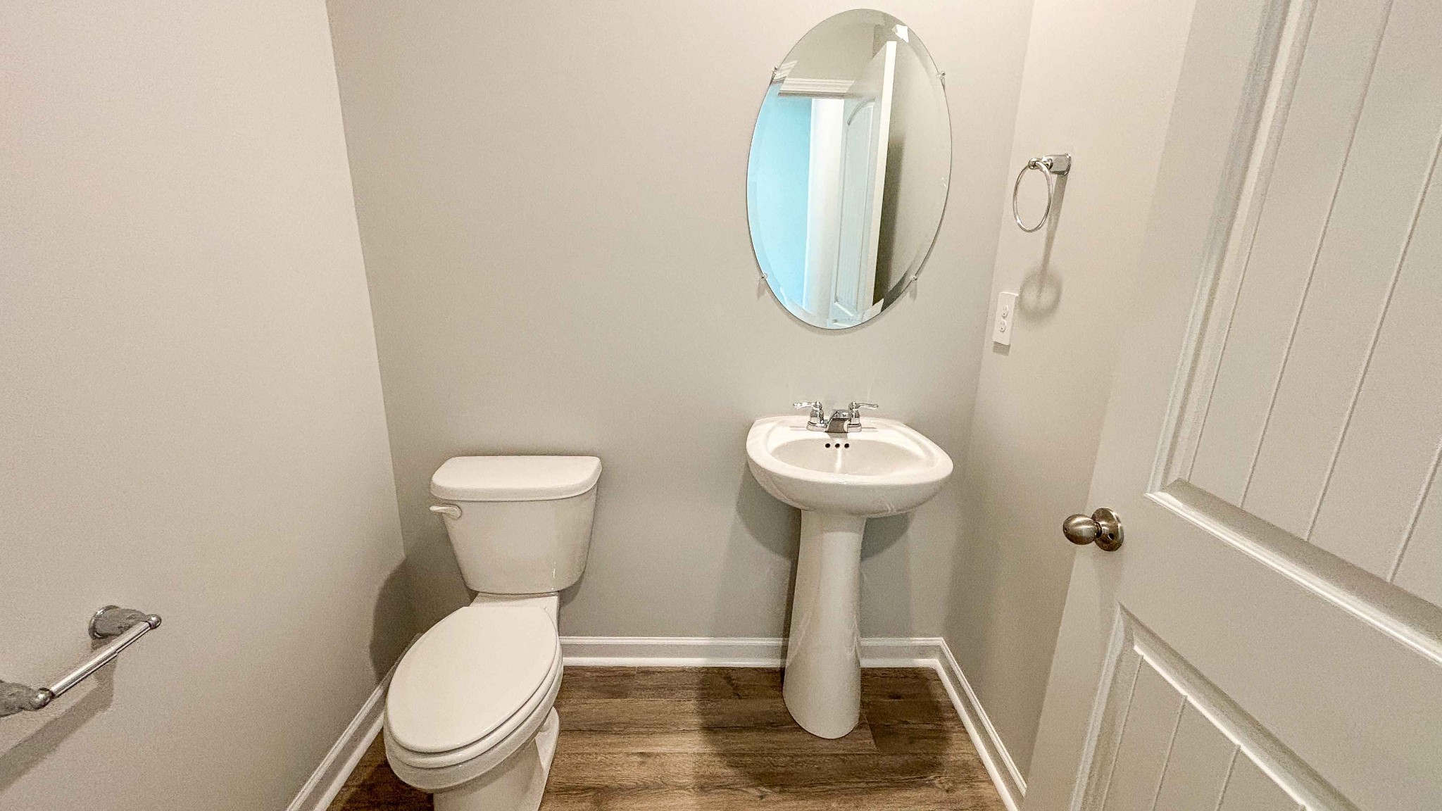301 Harvest Point Boulevard Spring Hill, TN 37174 - Photo 10 of 25 a bathroom with a sink toilet and a mirror