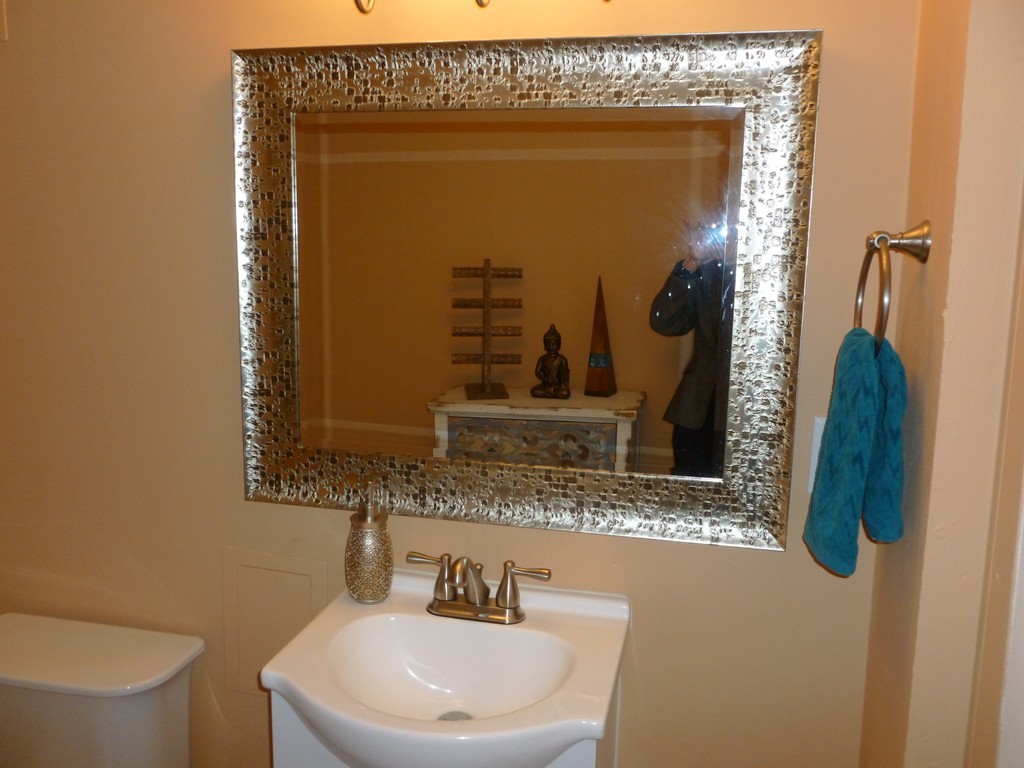 78 Westchester Circle Dedham, MA 02026 - Photo 18 of 24 a bathroom with a sink a mirror and a toilet