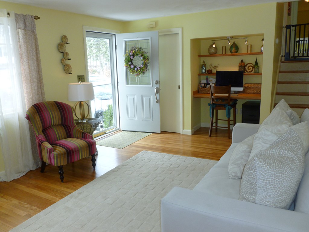 78 Westchester Circle Dedham, MA 02026 - Photo 2 of 24 a living room with furniture and a flat screen tv