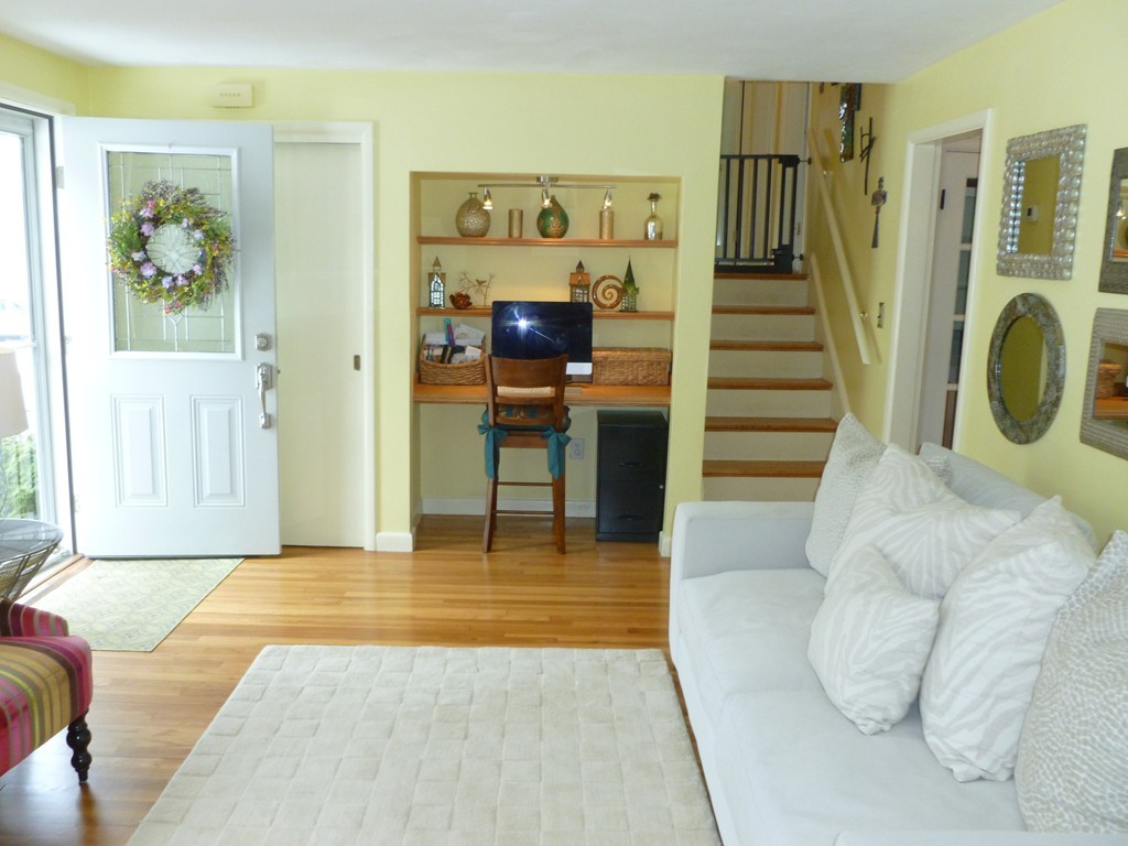 78 Westchester Circle Dedham, MA 02026 - Photo 3 of 24 a view of an entryway with furniture