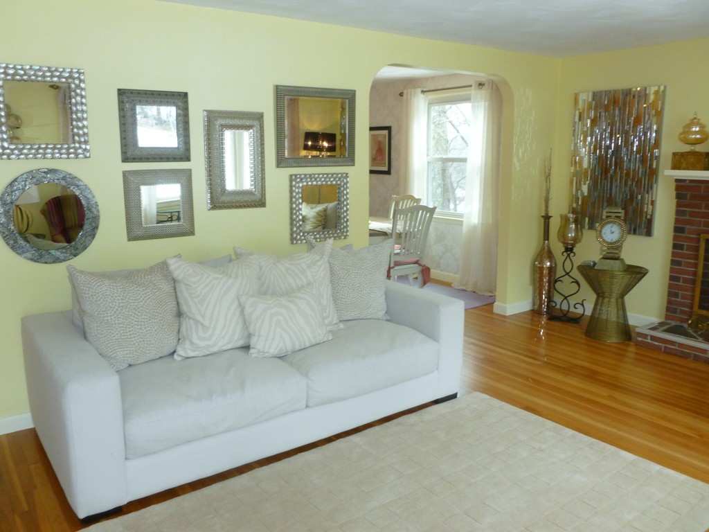 78 Westchester Circle Dedham, MA 02026 - Photo 5 of 24 a living room with furniture and a fireplace