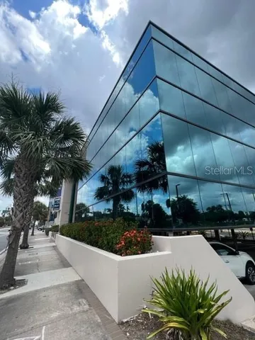 a view of street from balcony