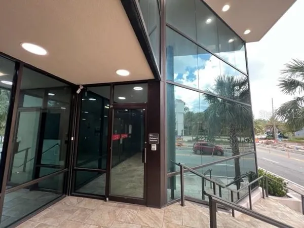 a room with lots of glass door and glass door